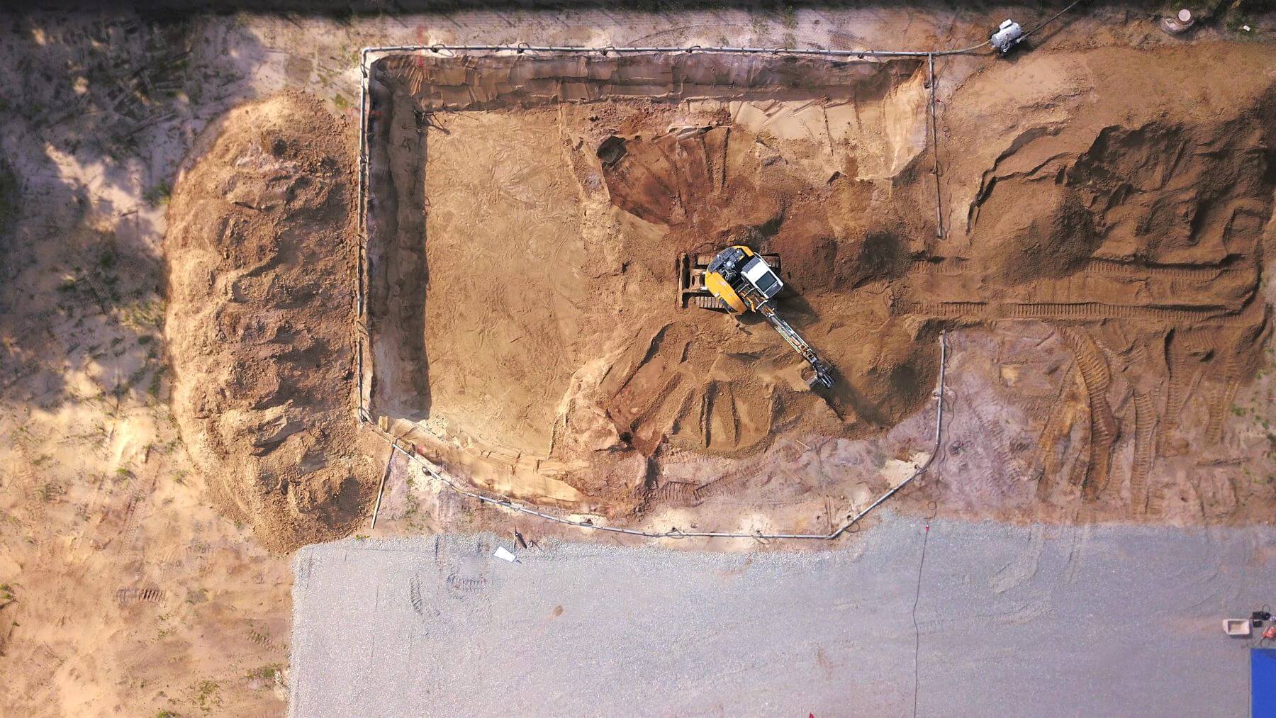 Bird's eye view of excavator on a construction site